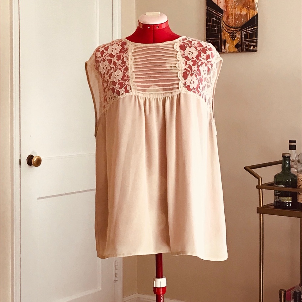 Sheer nude sleeveless top with lace detail